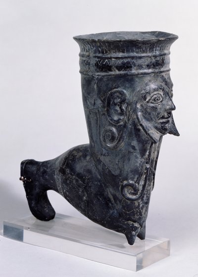 Bucchero vessel in the form of a leg with sculpted face, Etruscan period, 2nd half of 6th century BC by Etruscan